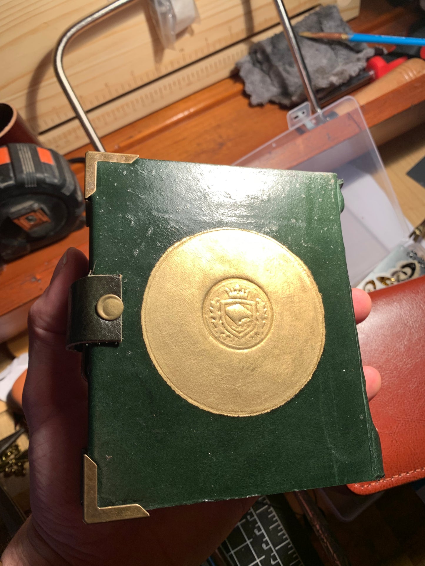Veggie tanned dark green leather saints journal with unique clasp and medieval border design 400 pages fine paper