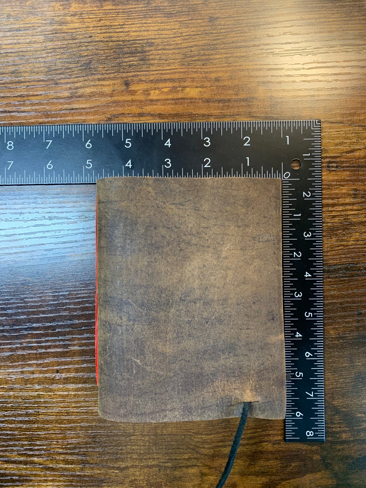 Simple Buffalo Leather travel journal red thread - Now on display at the Ferry County Food Co-op in Republic, WA!
