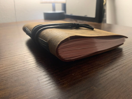 Simple Buffalo Leather Travel Journal gray thread, now on display at the Ferry County Food Co-op in Republic, WA!